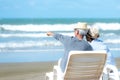 Lifestyle asian senior couple happy and relax on the beach.ÃÂ  Royalty Free Stock Photo